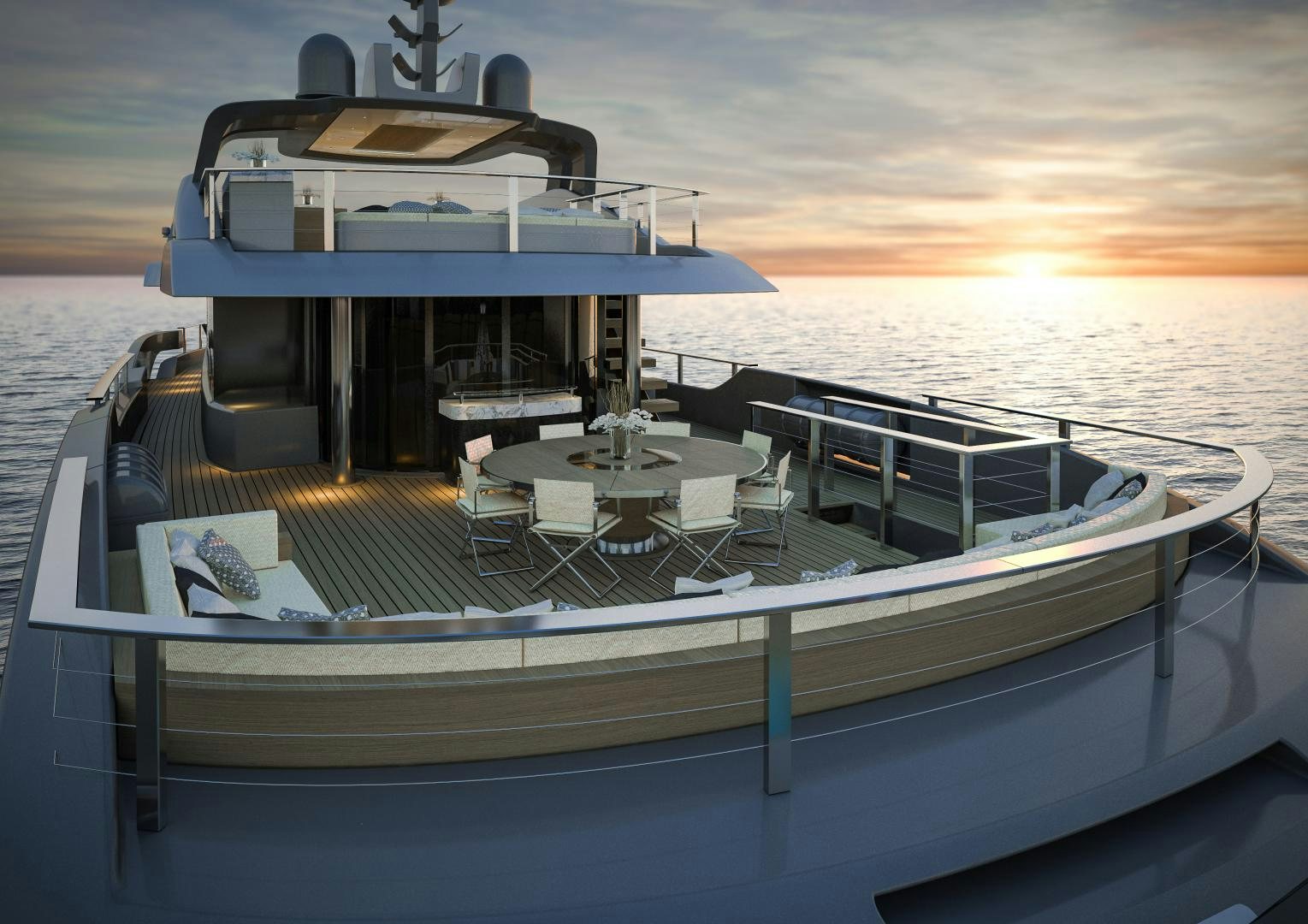 a deck with a table and chairs on it aboard ARIES Yacht for Sale
