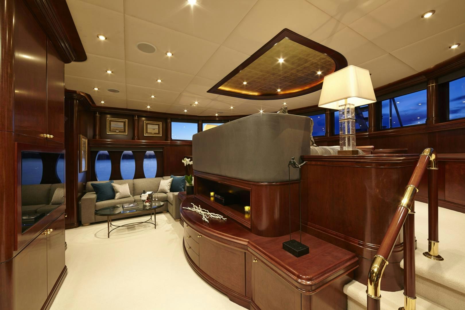 a room with a piano and a chair and a table aboard ZOOM ZOOM ZOOM Yacht for Sale