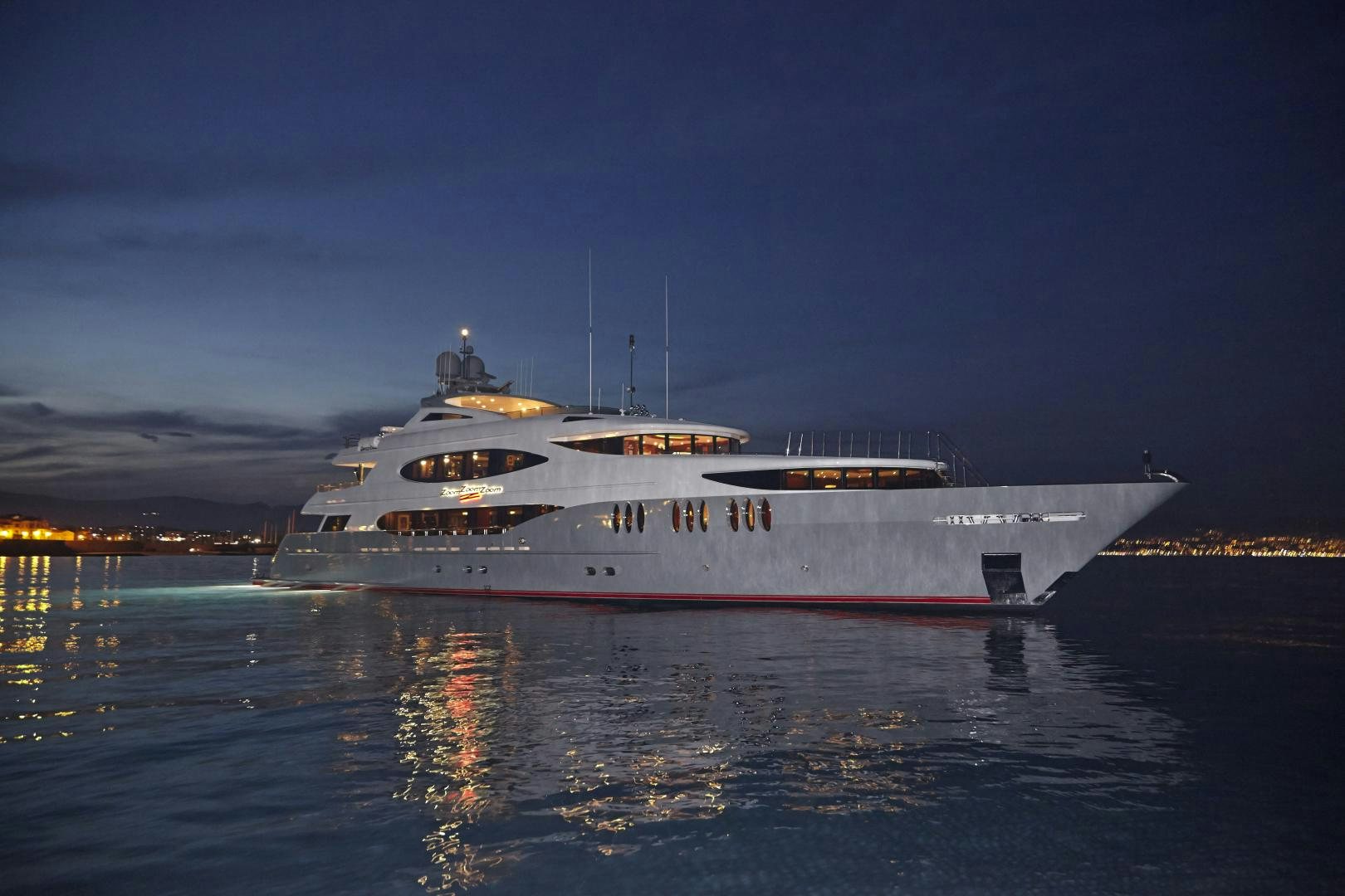 a large white ship in the water aboard ZOOM ZOOM ZOOM Yacht for Sale