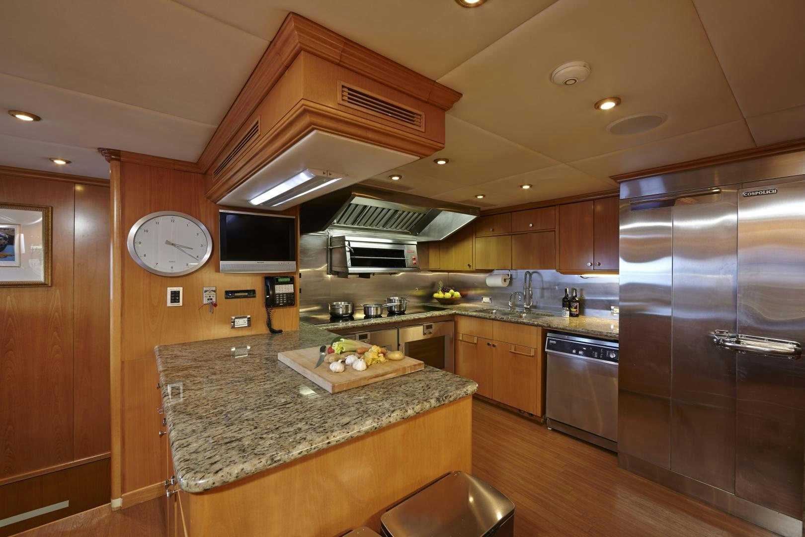 a kitchen with a large island aboard ZOOM ZOOM ZOOM Yacht for Sale