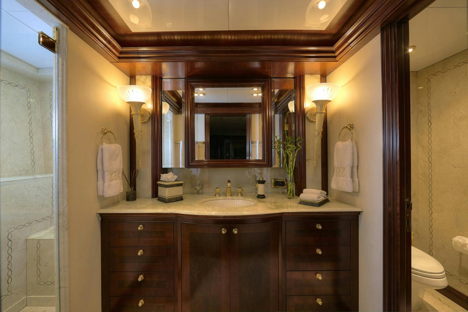 a bathroom with a sink and a mirror aboard ZOOM ZOOM ZOOM Yacht for Sale