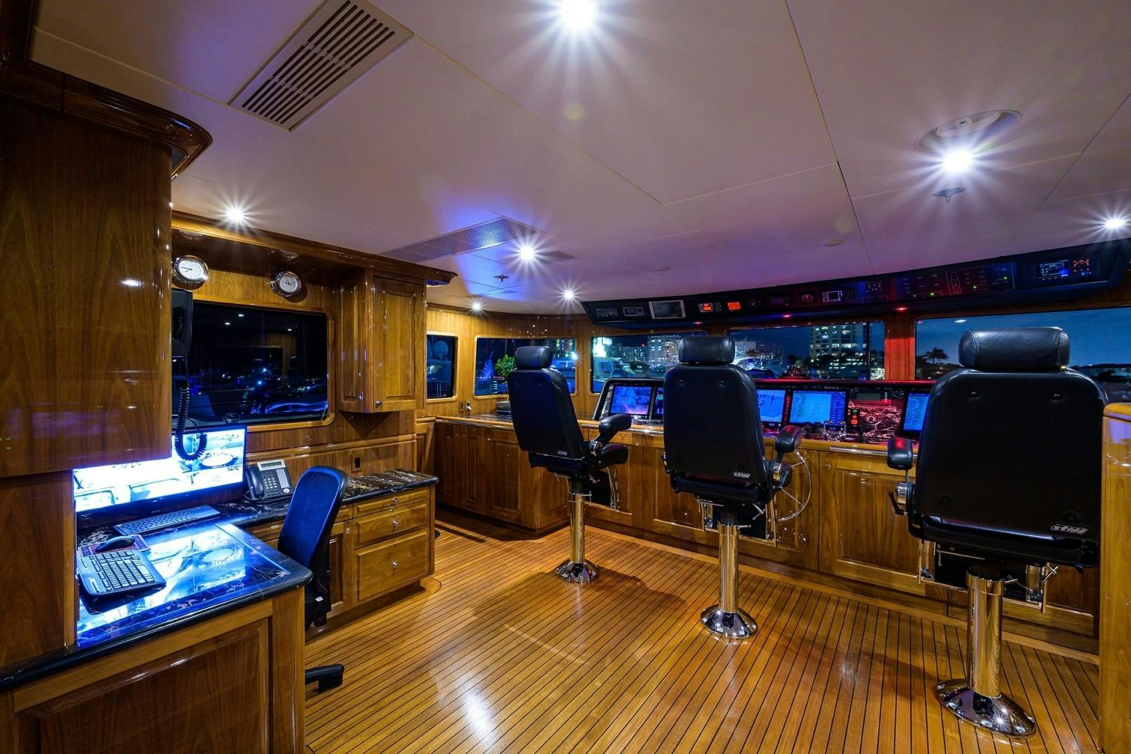 a room with a desk and chairs aboard REMEMBER WHEN Yacht for Sale