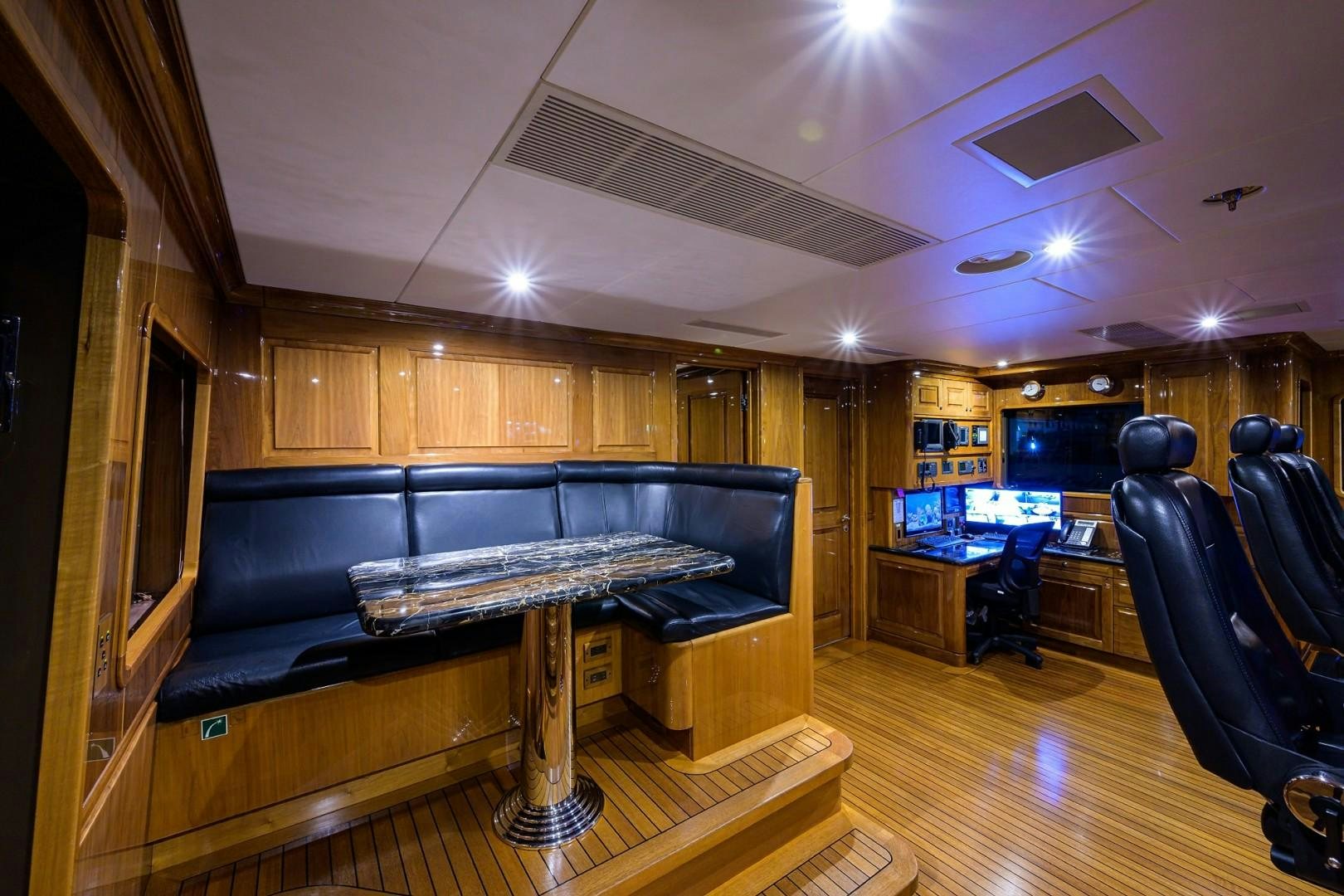 a room with a piano and a piano aboard REMEMBER WHEN Yacht for Sale