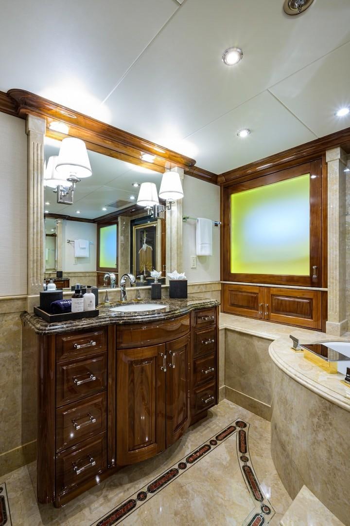 a bathroom with a large mirror aboard REMEMBER WHEN Yacht for Sale