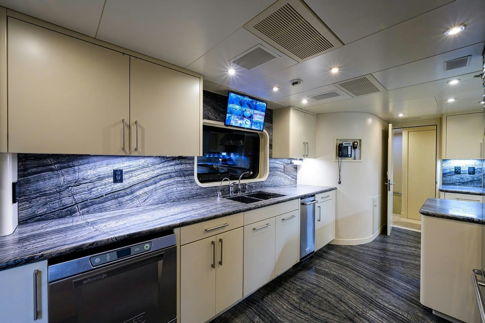 a kitchen with a large countertop aboard REMEMBER WHEN Yacht for Sale