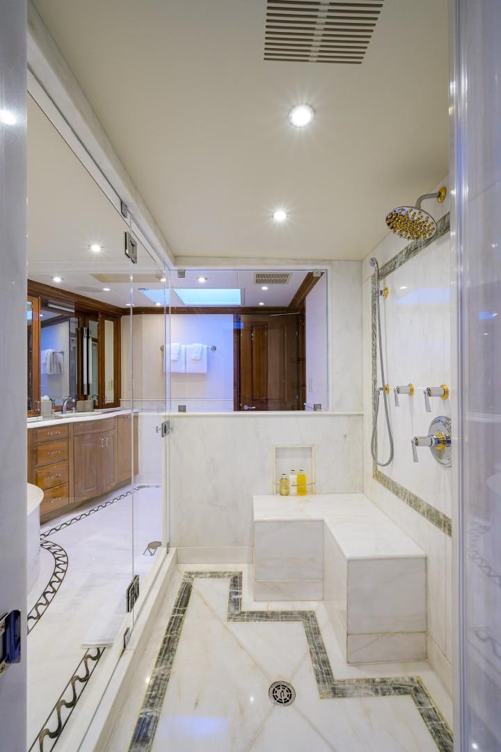 a bathroom with a large mirror aboard REMEMBER WHEN Yacht for Sale