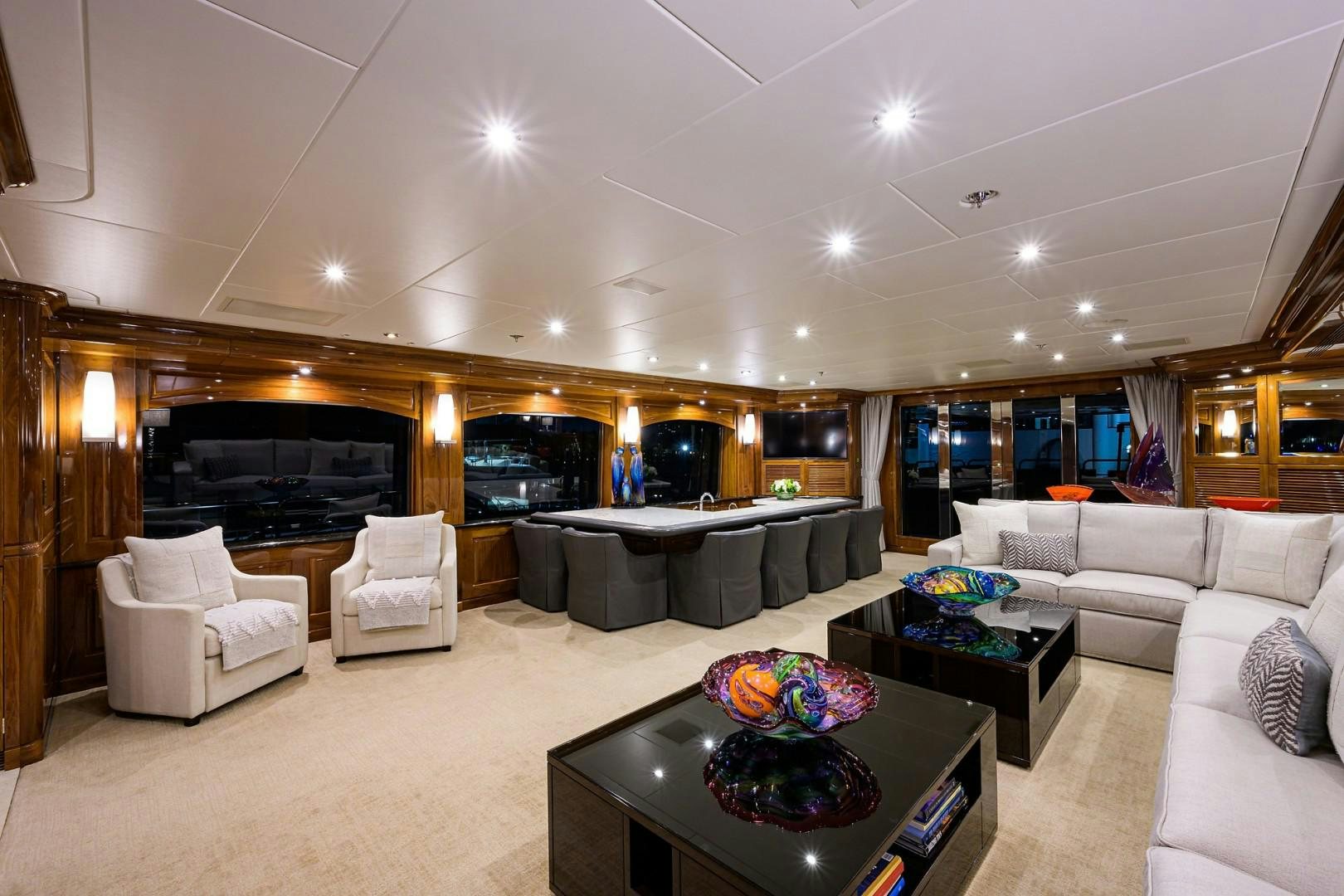 a living room with a large fireplace aboard REMEMBER WHEN Yacht for Sale
