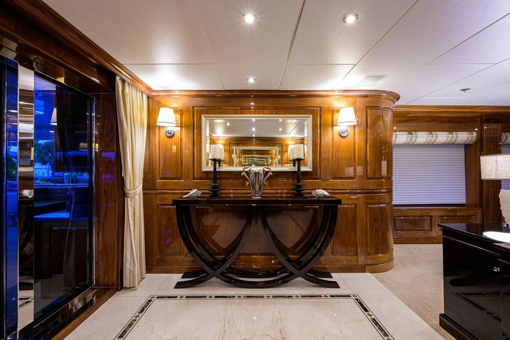 a large fireplace in a room aboard REMEMBER WHEN Yacht for Sale