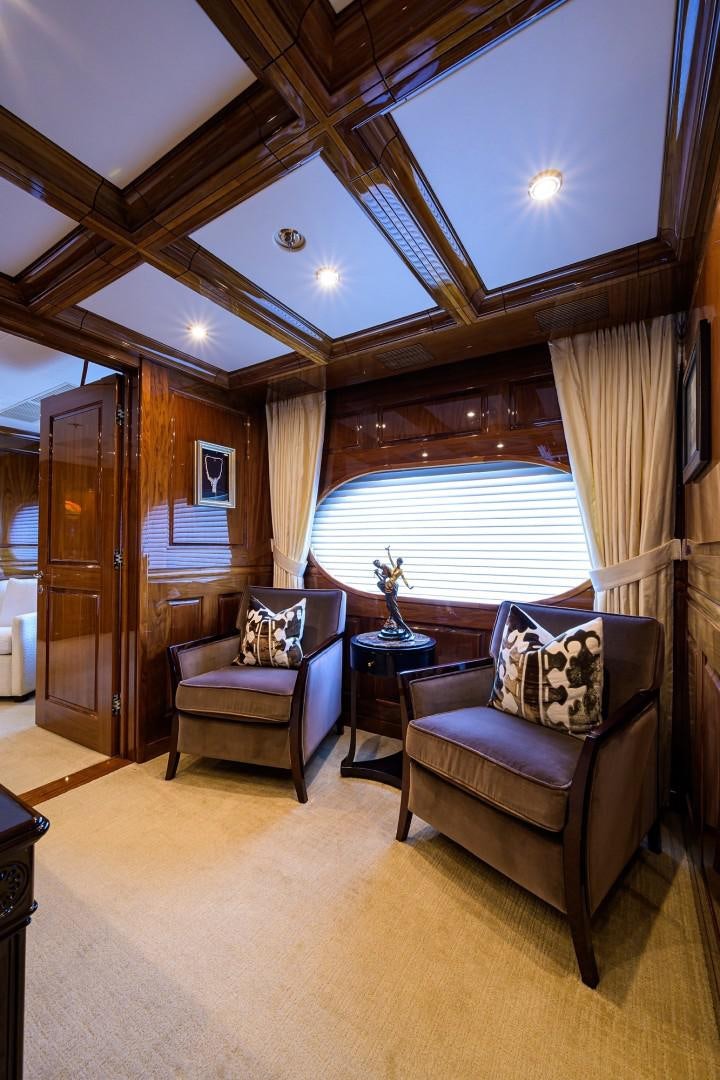 a living room with a large window aboard REMEMBER WHEN Yacht for Sale