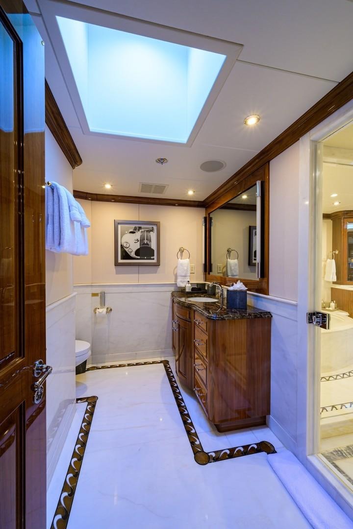 a bathroom with a large mirror aboard REMEMBER WHEN Yacht for Sale
