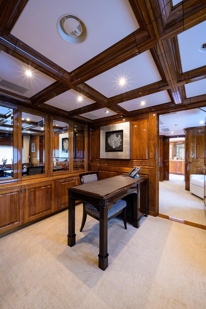 a room with a table and chairs aboard REMEMBER WHEN Yacht for Sale