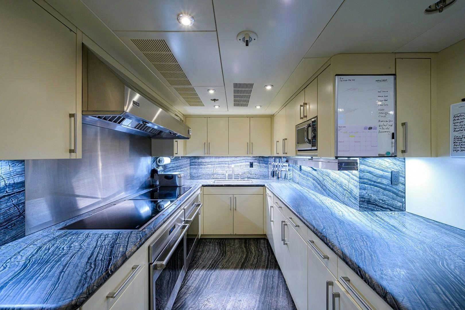 a kitchen with a large countertop aboard REMEMBER WHEN Yacht for Sale