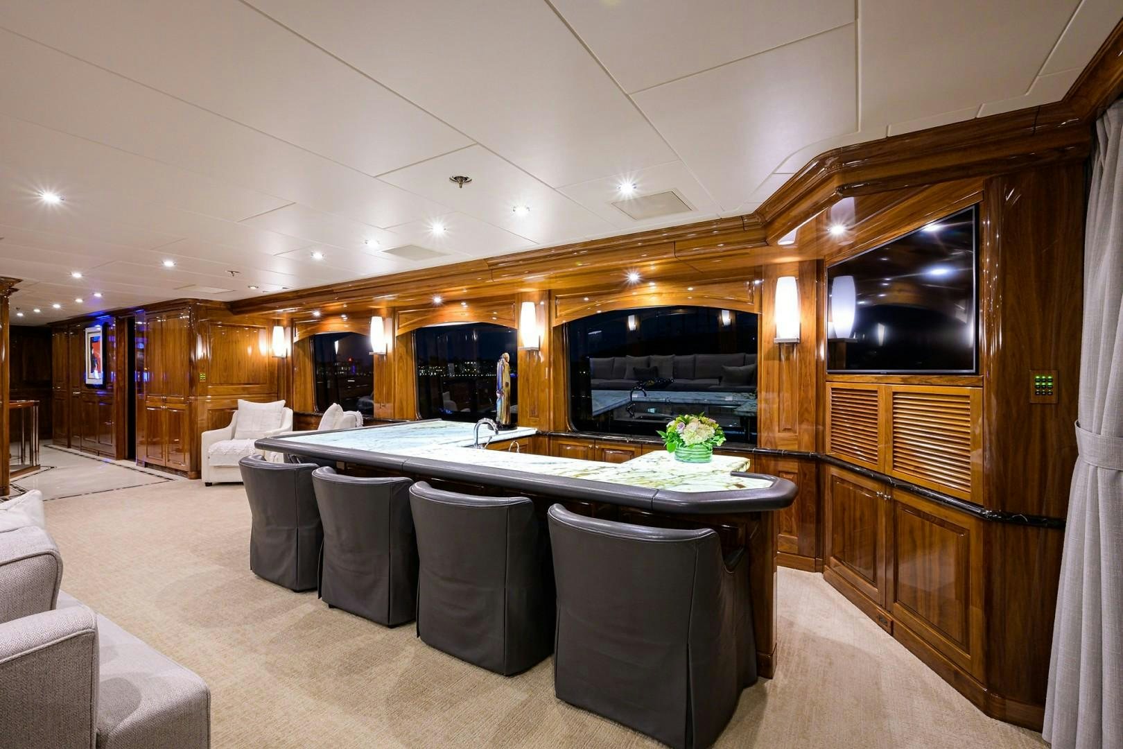 a room with a table and chairs aboard REMEMBER WHEN Yacht for Sale