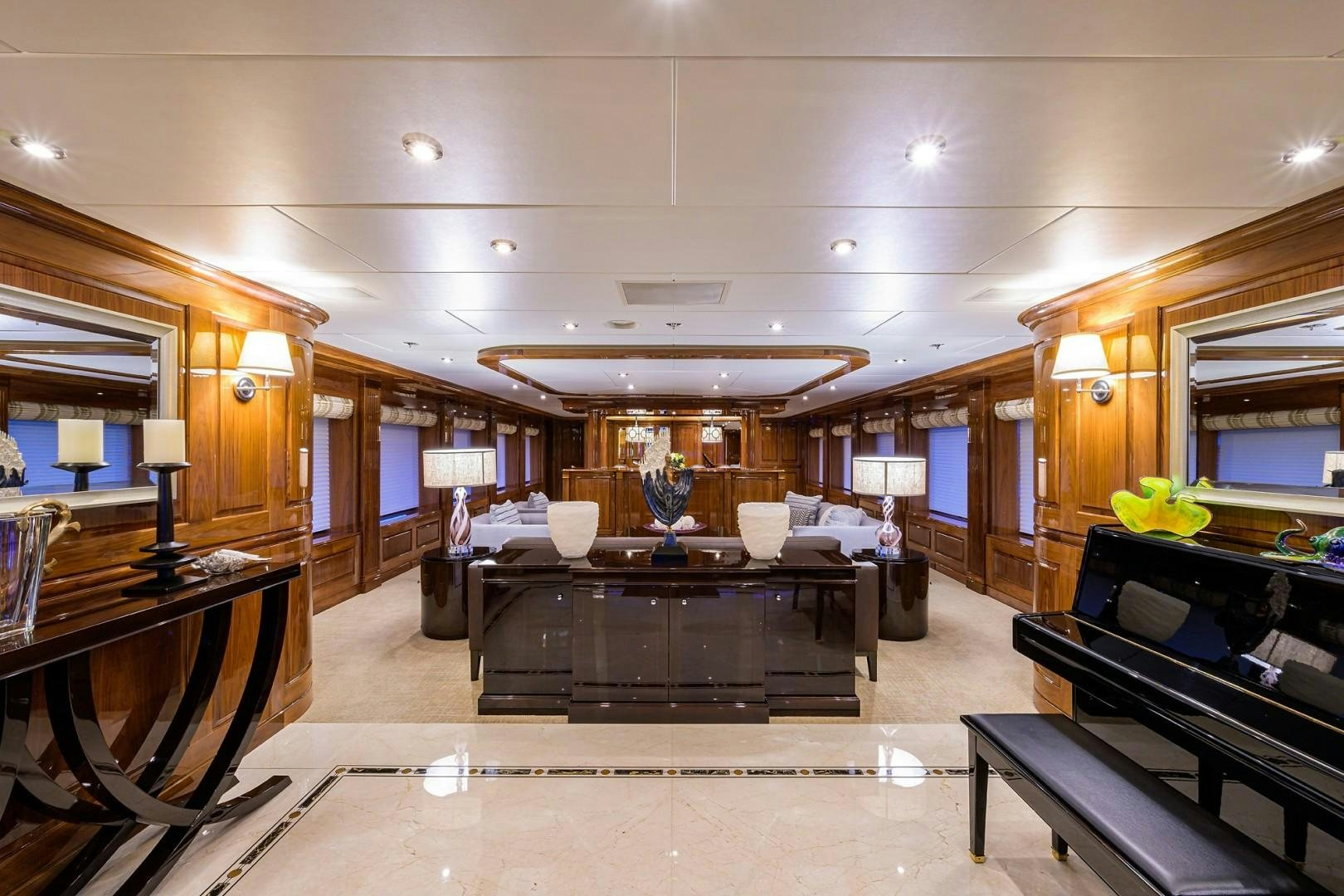 a living room with a large mirror aboard REMEMBER WHEN Yacht for Sale