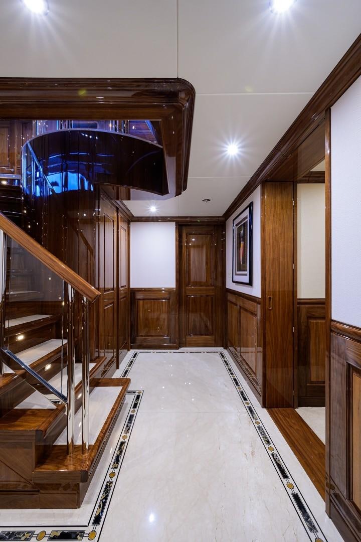 a hallway with a glass door aboard REMEMBER WHEN Yacht for Sale