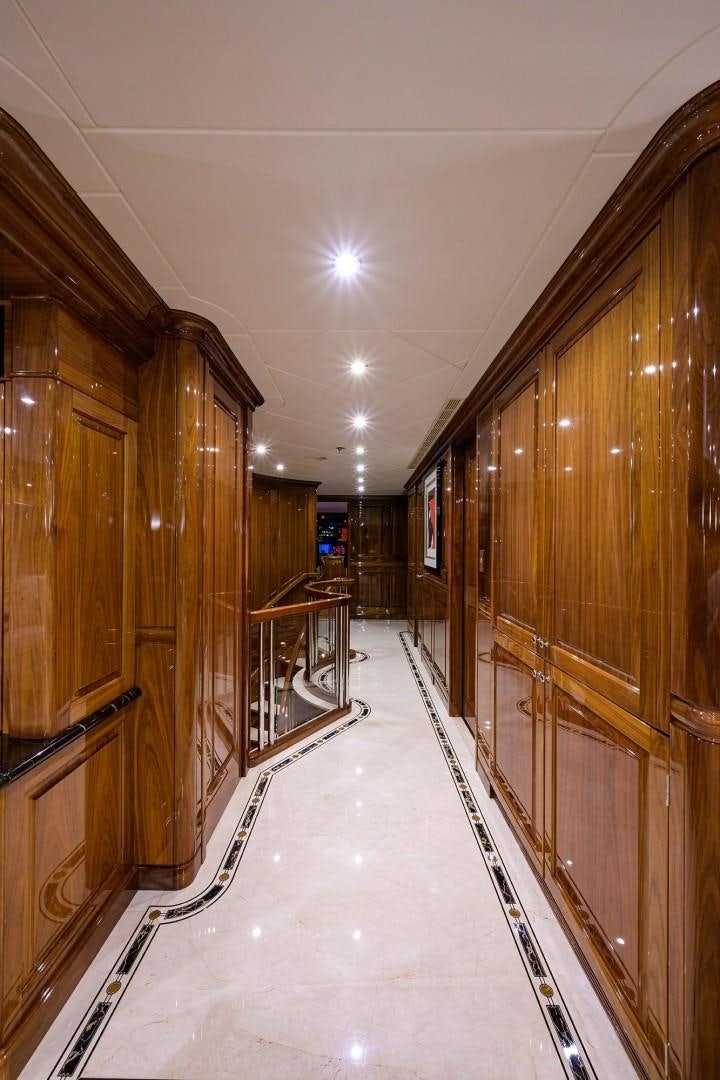 a long hallway with wooden doors aboard REMEMBER WHEN Yacht for Sale