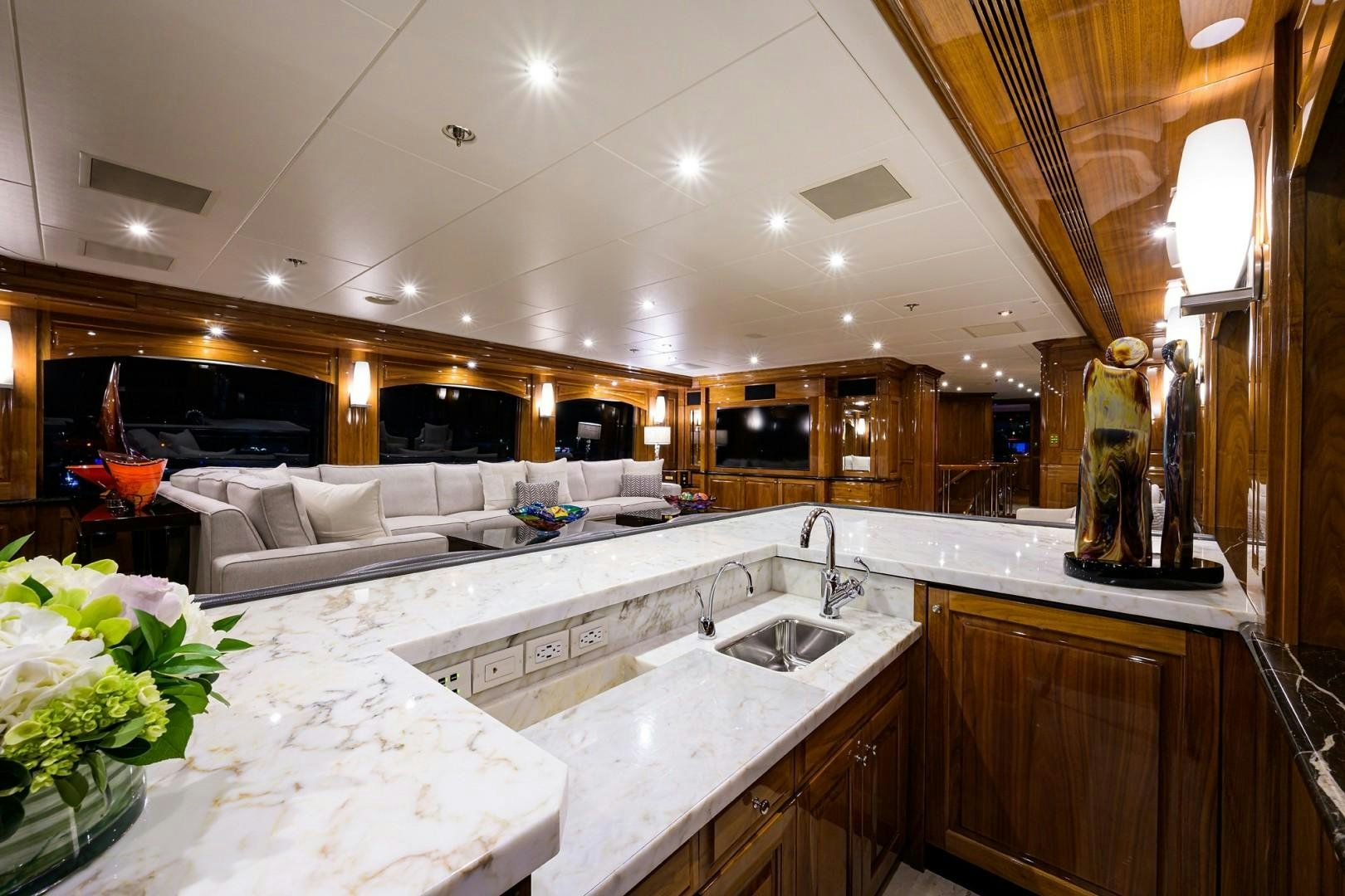 a large kitchen with a large white table and a large white table aboard REMEMBER WHEN Yacht for Sale