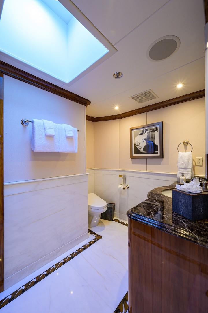 a bathroom with a sink and a toilet aboard REMEMBER WHEN Yacht for Sale