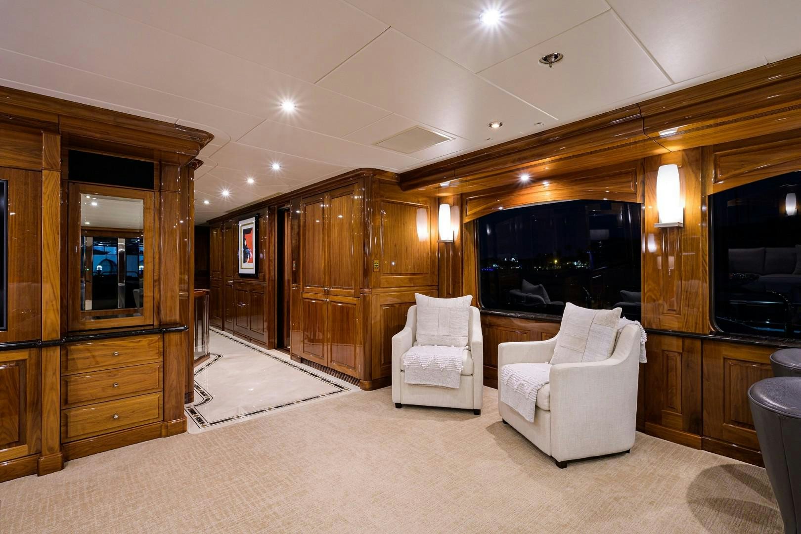 a room with a fireplace and furniture aboard REMEMBER WHEN Yacht for Sale