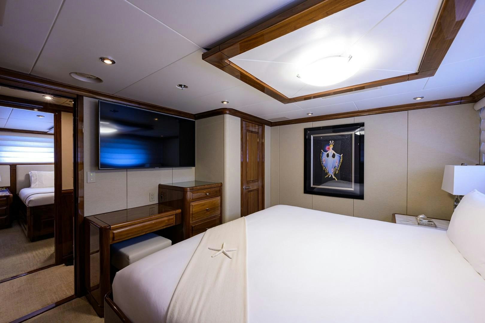 a bedroom with a large bed aboard REMEMBER WHEN Yacht for Sale