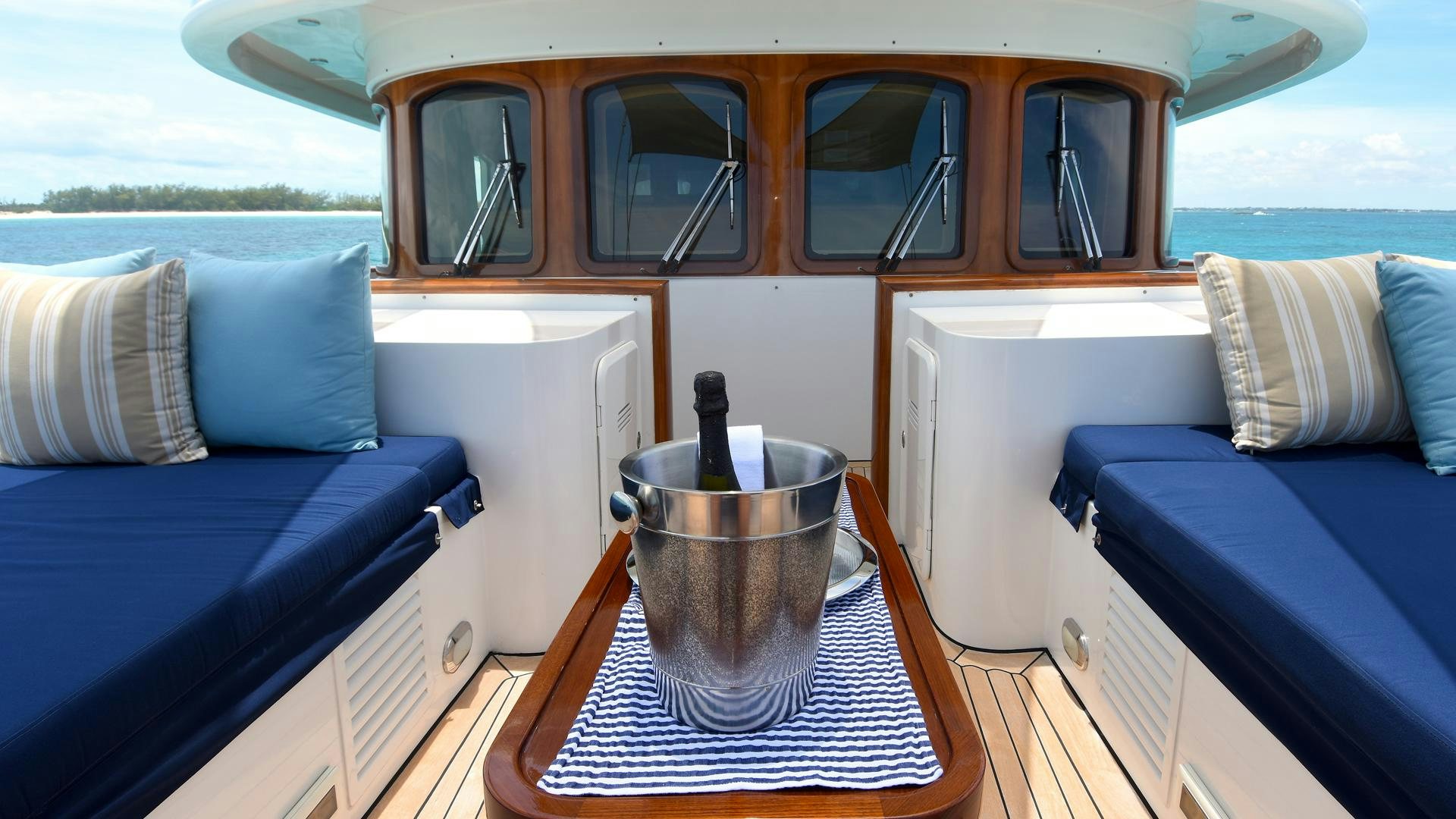 a boat with a bucket on the deck aboard OMNIA Yacht for Sale