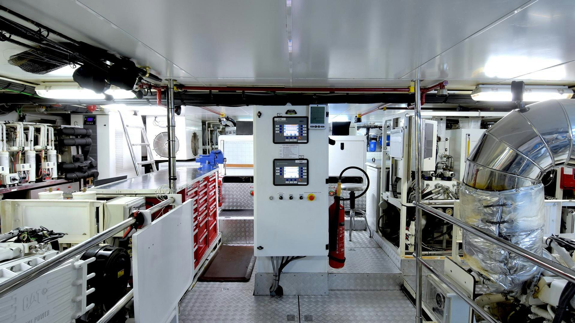 a large room with machines aboard OMNIA Yacht for Sale