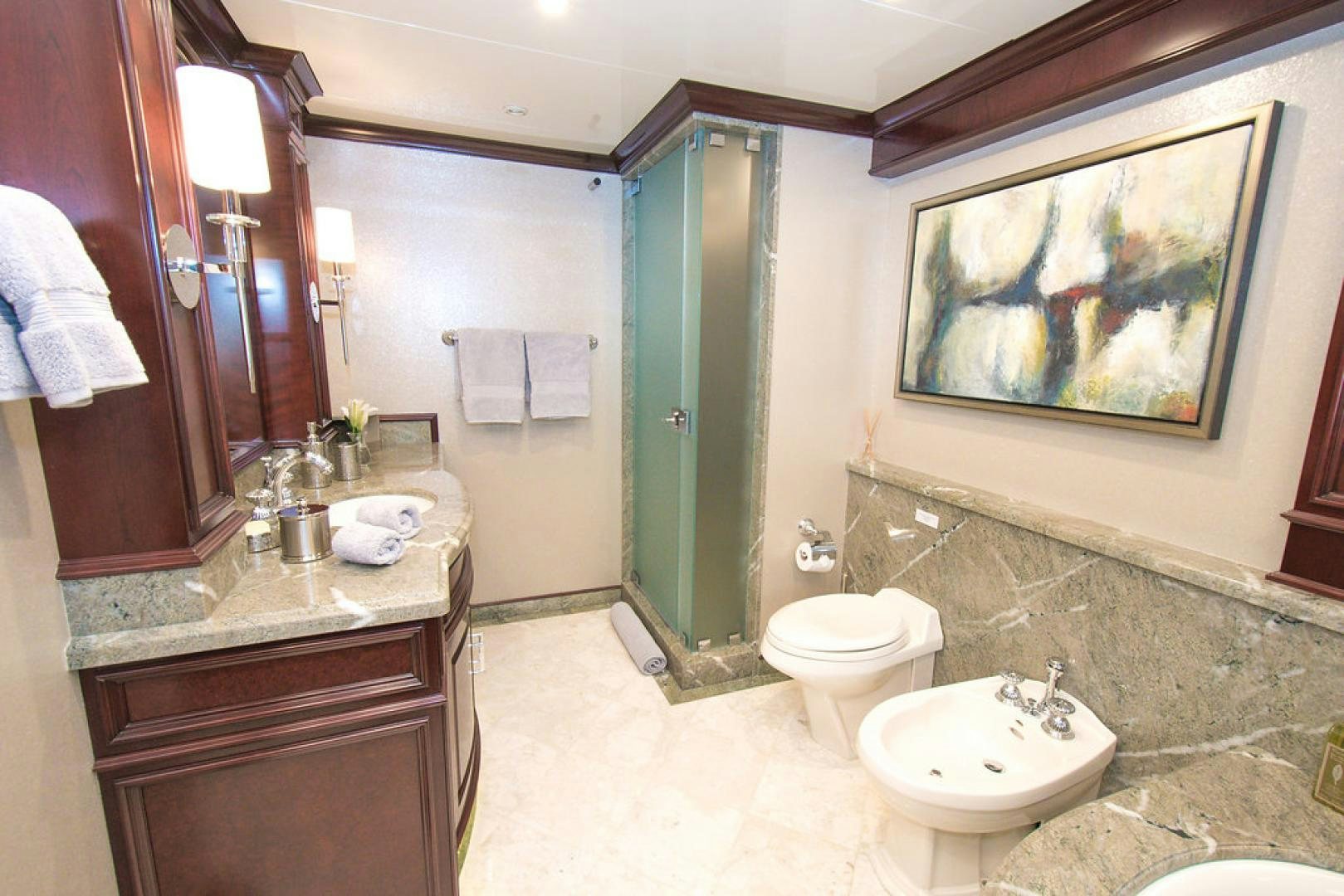 a bathroom with a marble counter top aboard REBEL Yacht for Sale
