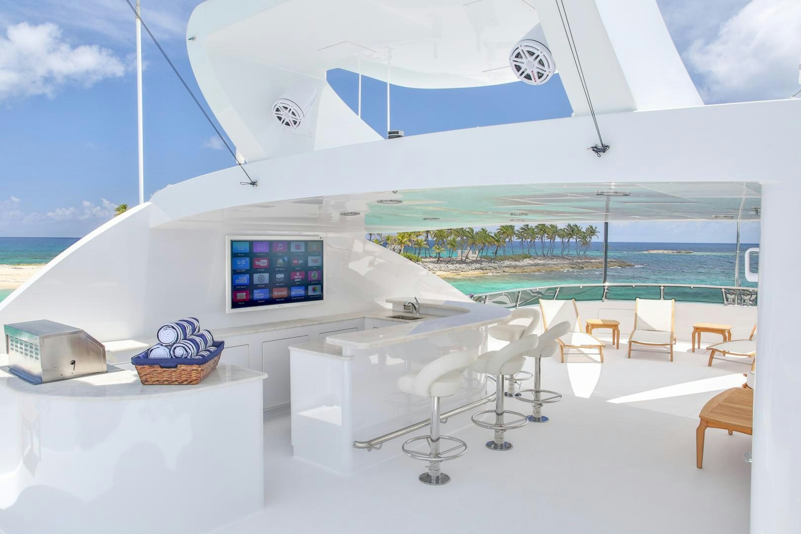 a room with a table and chairs aboard REBEL Yacht for Sale