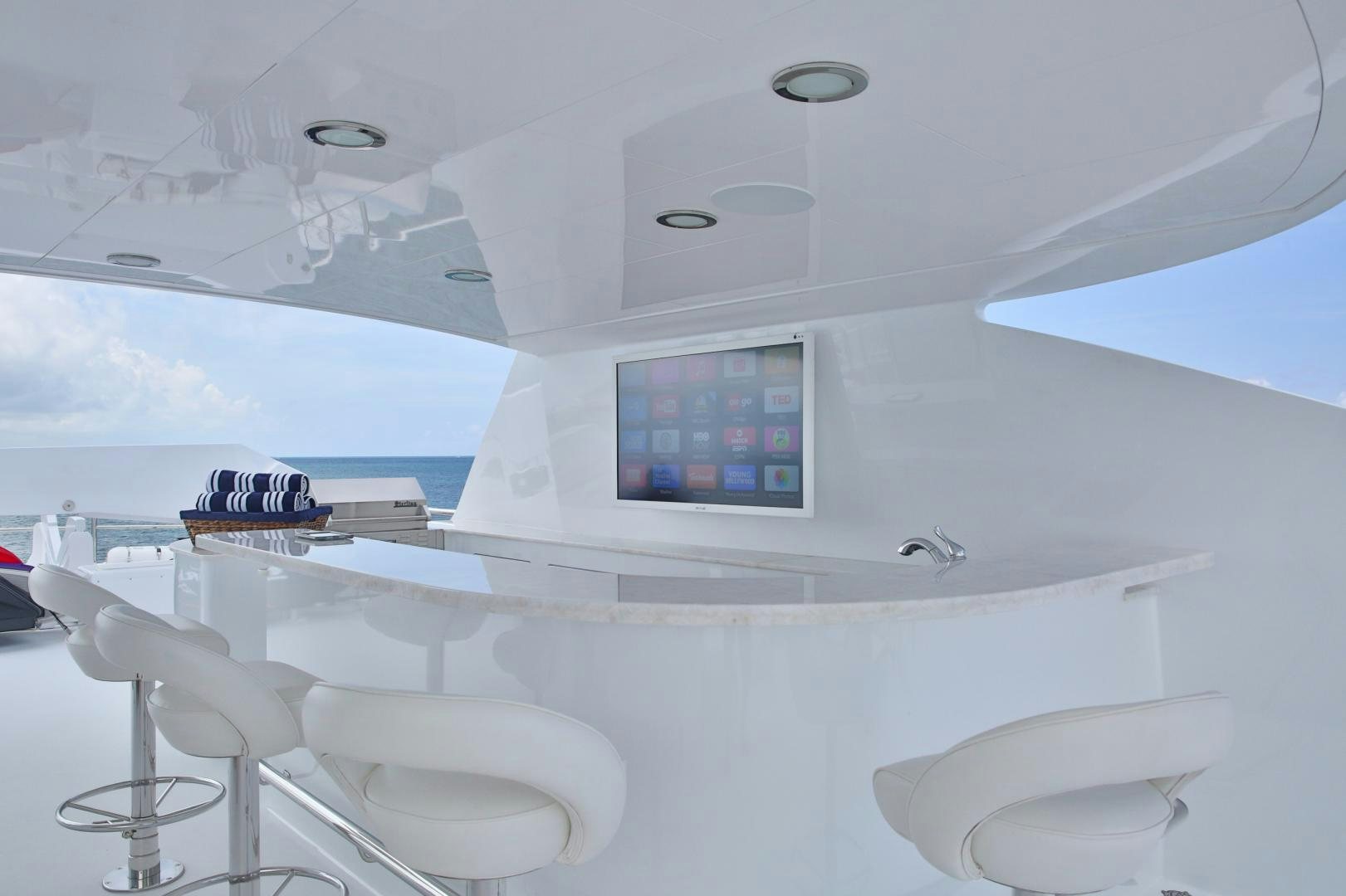 a bathroom with a sink and a mirror aboard REBEL Yacht for Sale