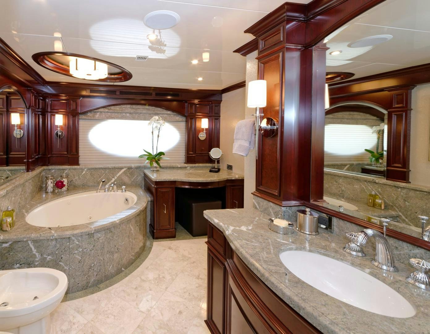a large bathroom with a large jacuzzi tub aboard REBEL Yacht for Sale