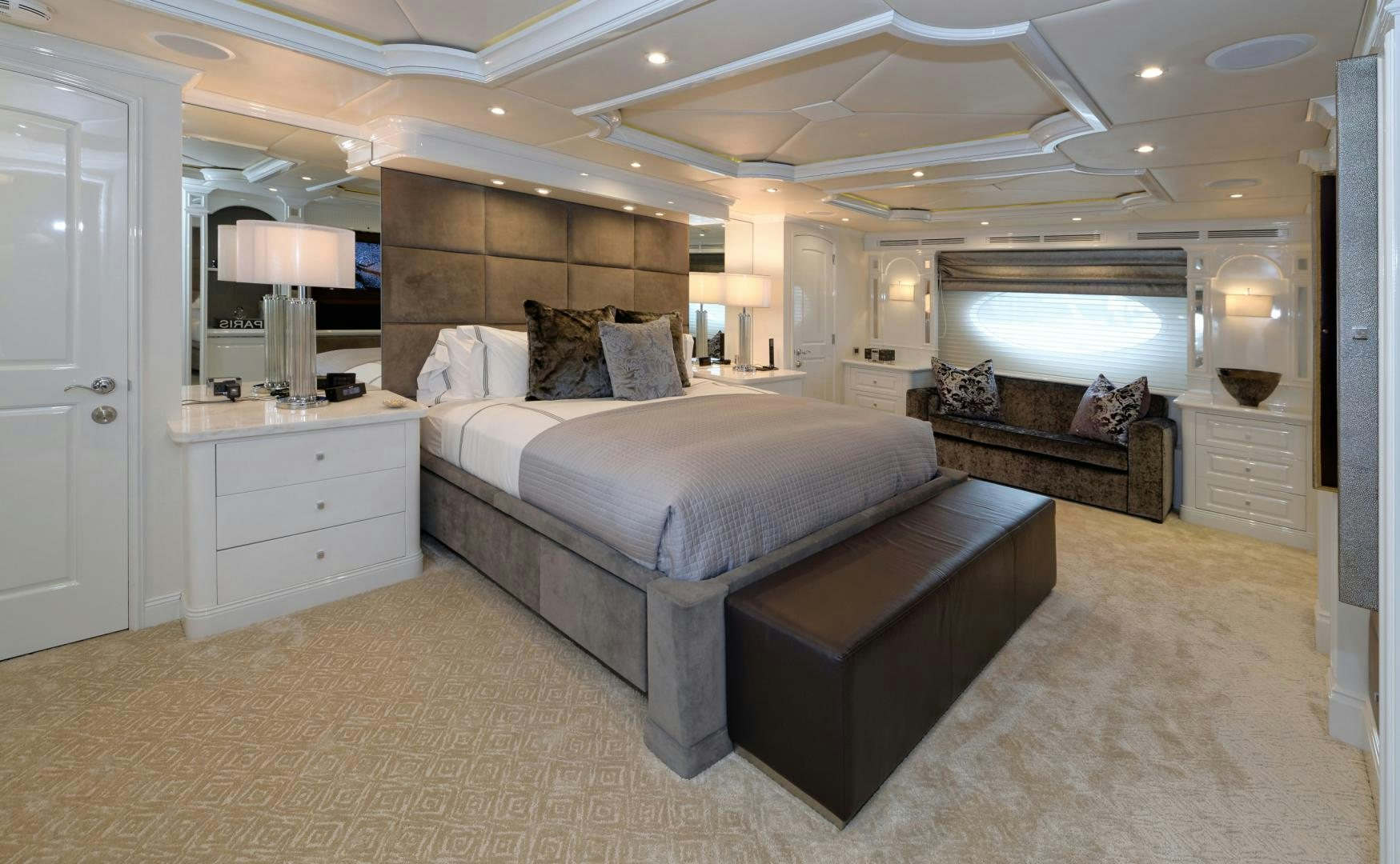 a large bedroom with a large bed aboard REBEL Yacht for Sale