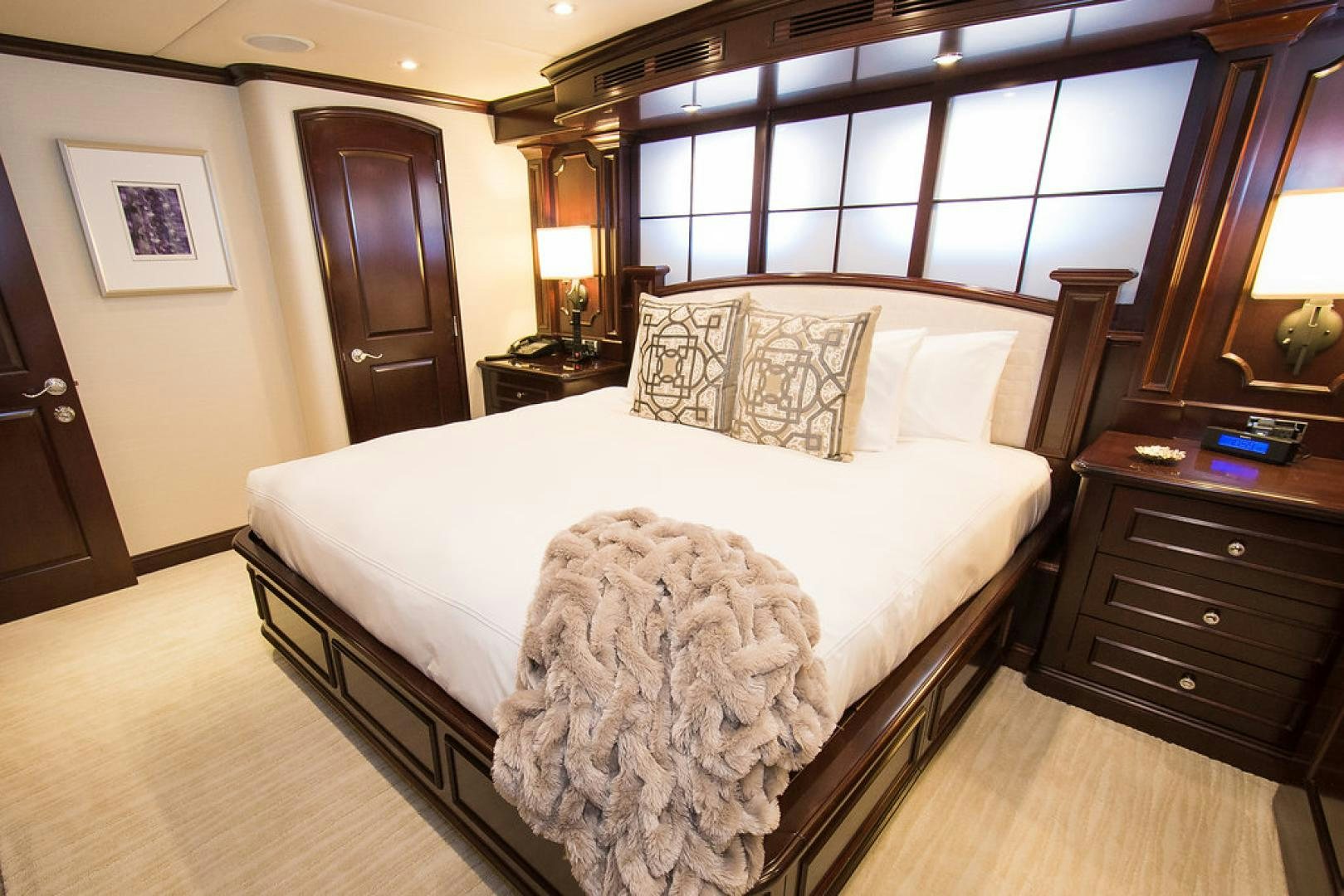 a large bed in a room aboard REBEL Yacht for Sale
