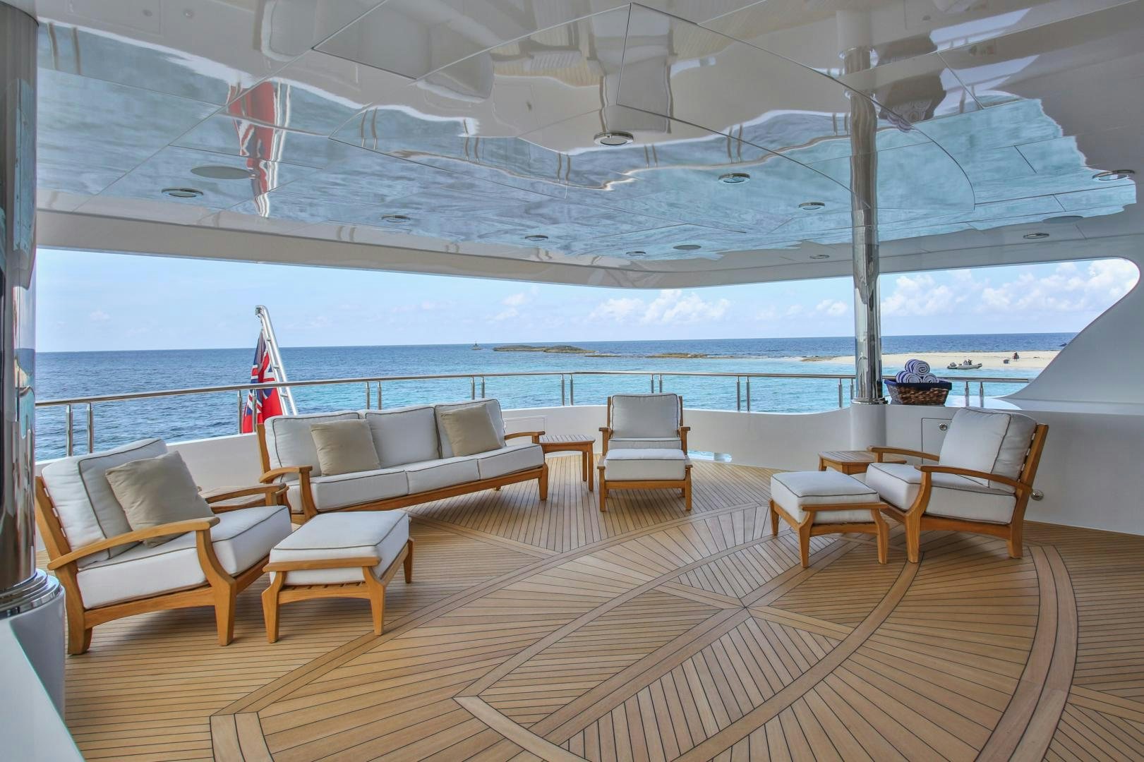 a room with a couch and chairs aboard REBEL Yacht for Sale