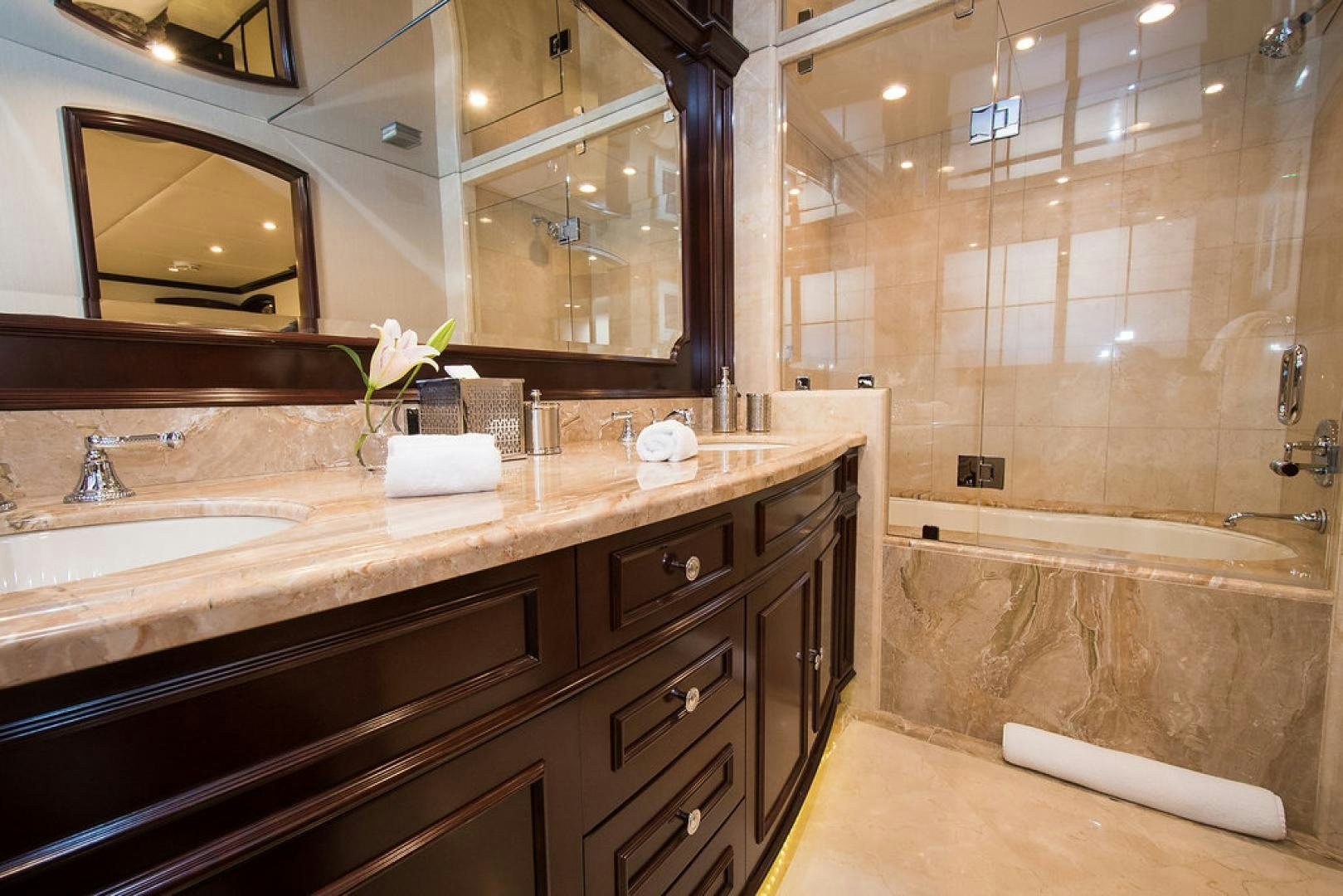 a bathroom with a large countertop aboard REBEL Yacht for Sale