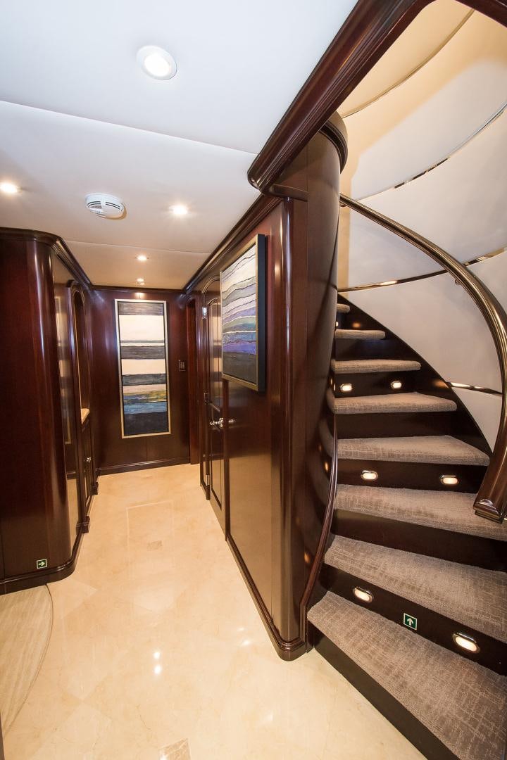 a hallway with a set of doors aboard REBEL Yacht for Sale