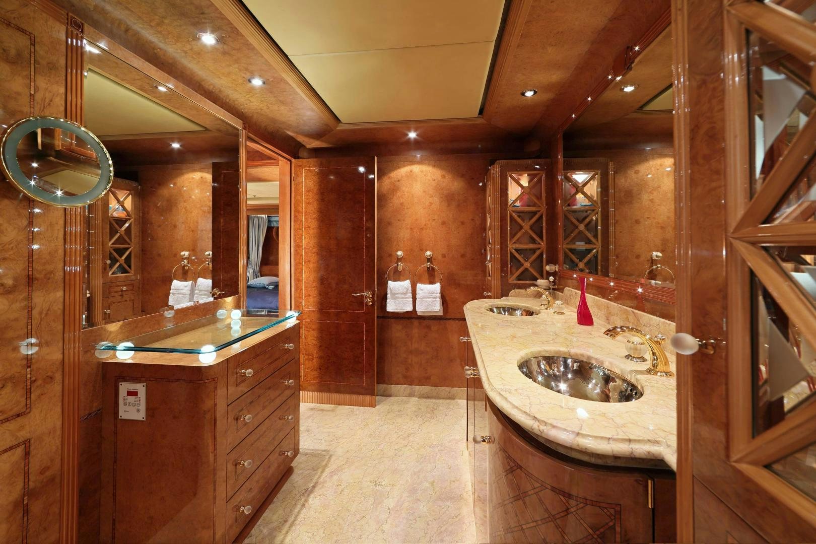 a bathroom with a sink and cabinets aboard DR NO NO Yacht for Sale