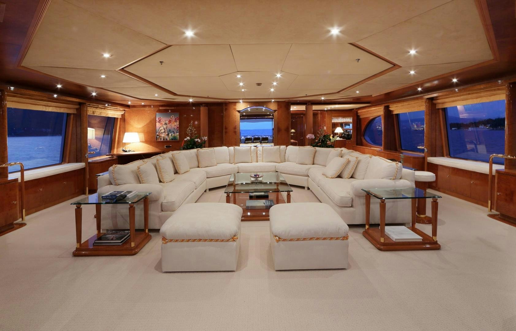 a living room with a large screen aboard DR NO NO Yacht for Sale