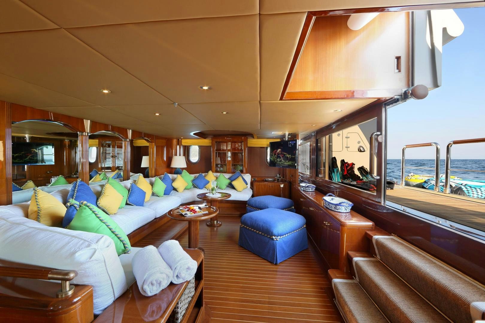 a room with a bed and a mirror aboard DR NO NO Yacht for Sale