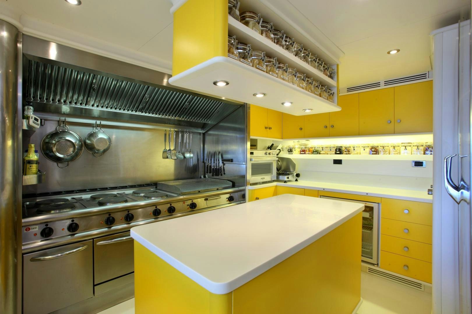 a kitchen with stainless steel appliances aboard DR NO NO Yacht for Sale