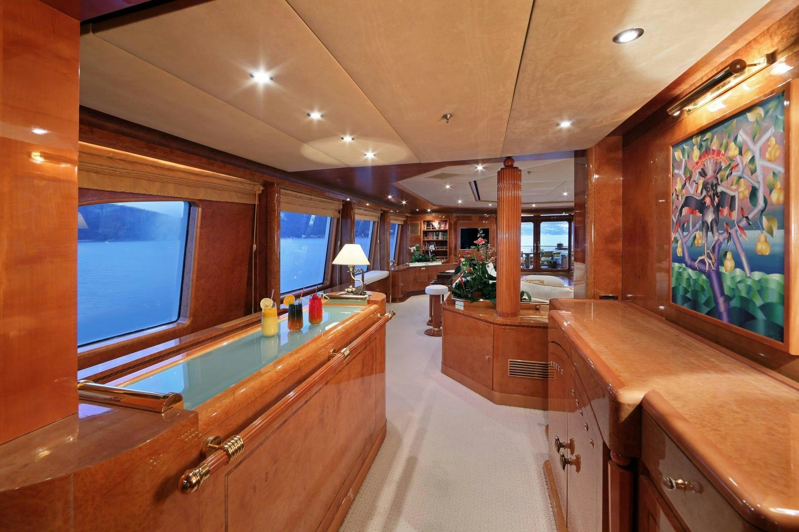 a room with wooden cabinets and a large window aboard DR NO NO Yacht for Sale