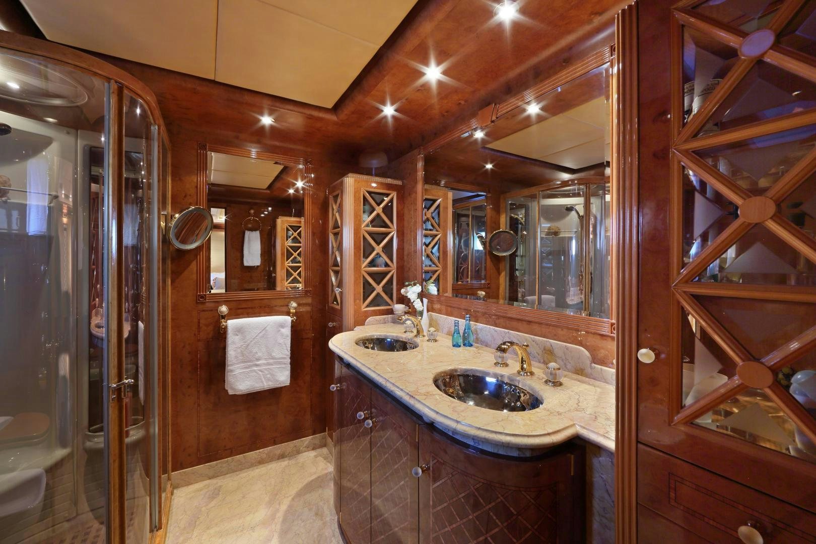 a bathroom with a sink and a mirror aboard DR NO NO Yacht for Sale