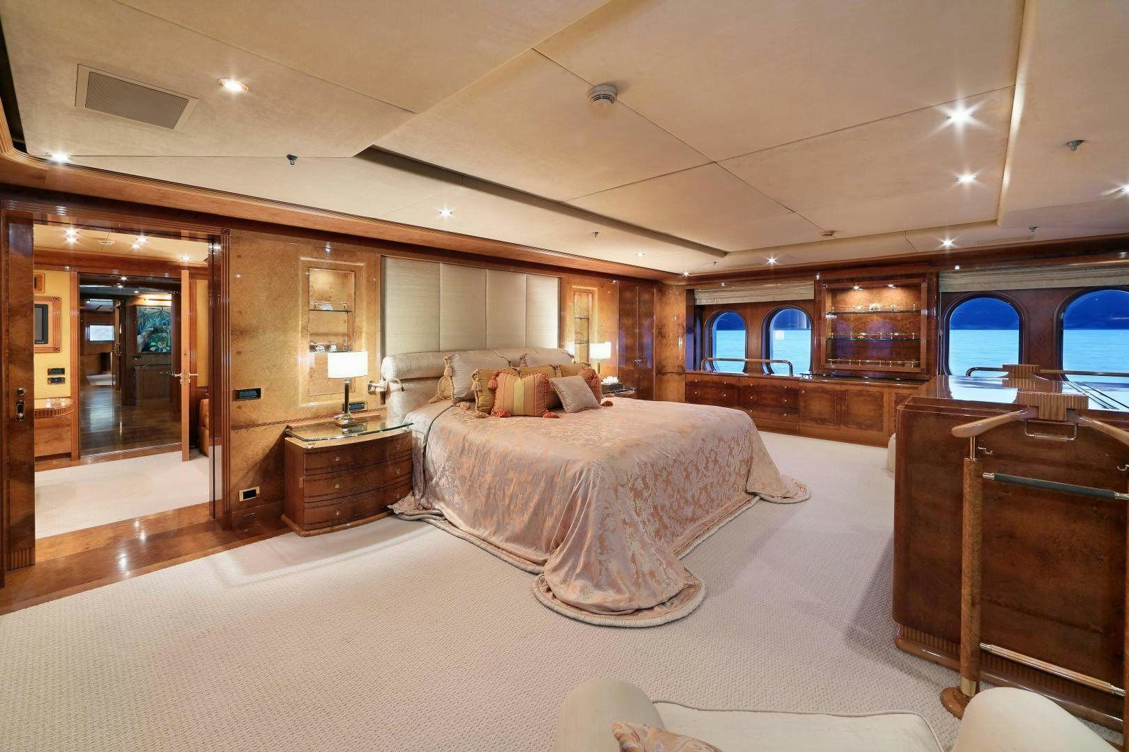 a large bedroom with a large bed aboard DR NO NO Yacht for Sale