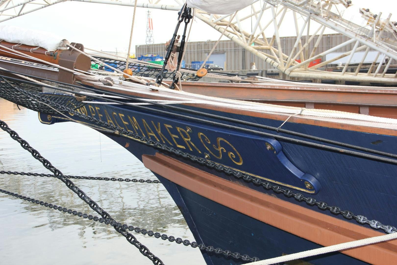 a boat tied to a dock aboard PEACEMAKER Yacht for Sale