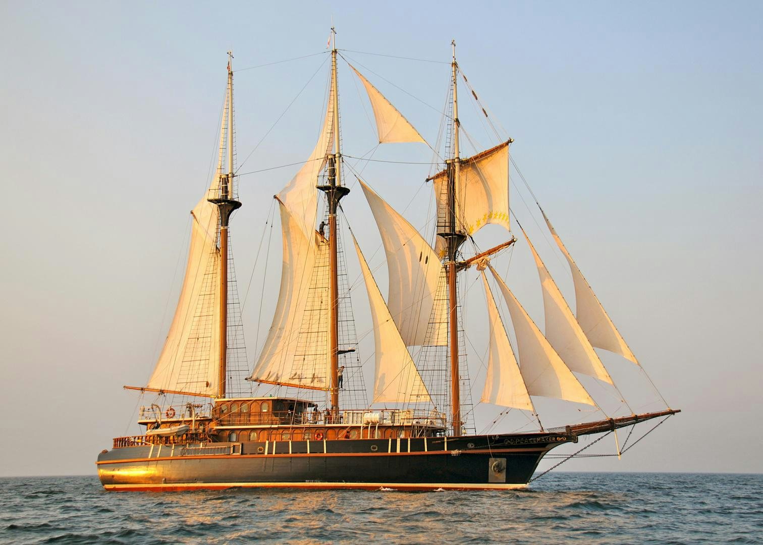 a large boat in the water aboard PEACEMAKER Yacht for Sale