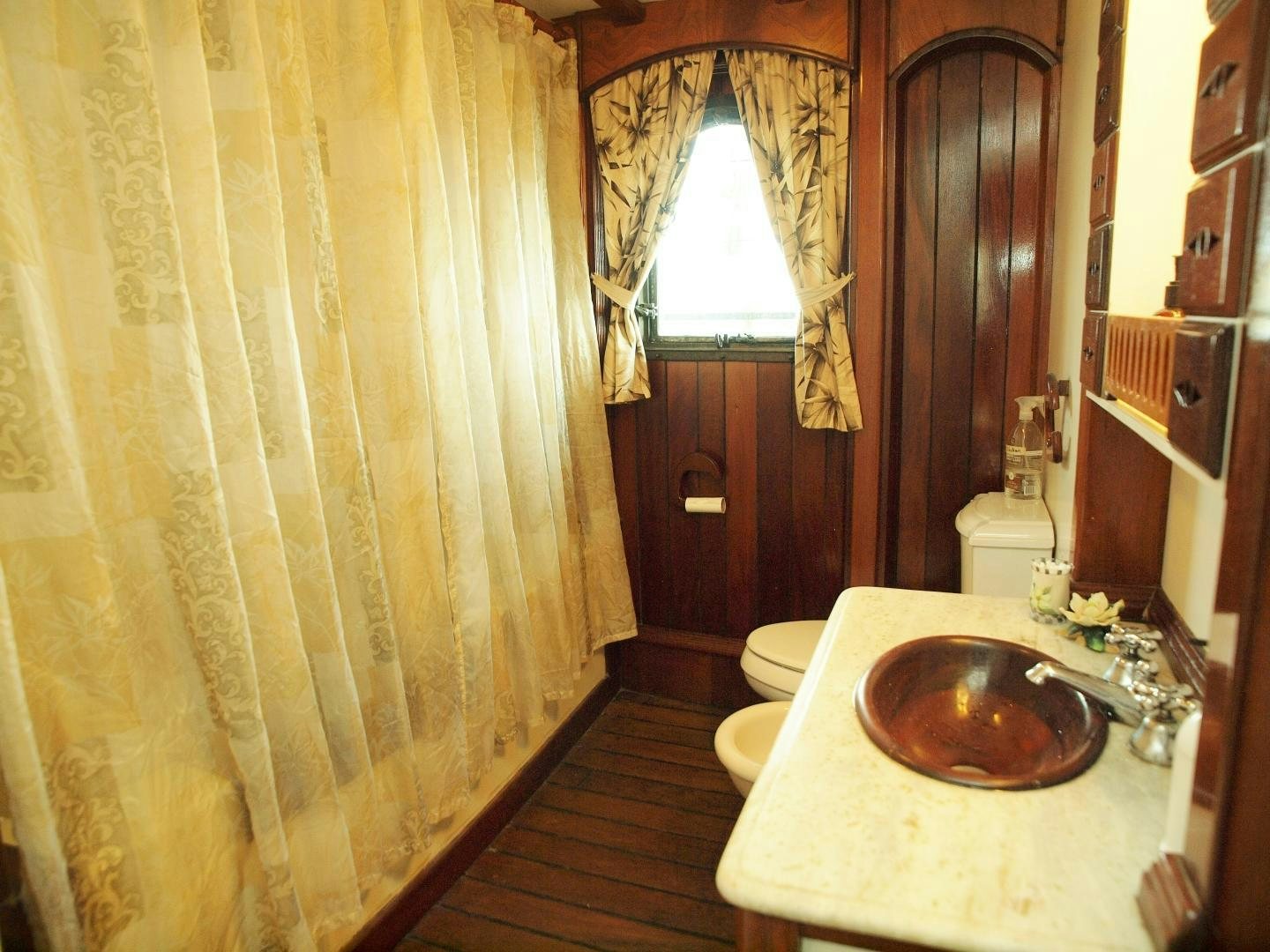 a bathroom with a sink and toilet aboard PEACEMAKER Yacht for Sale