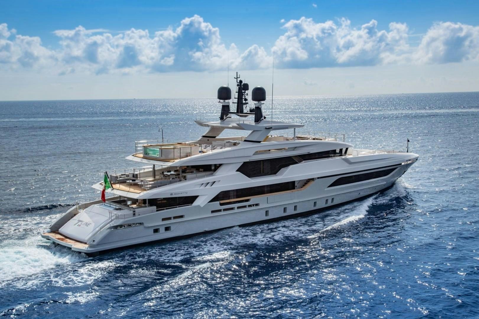 a large white ship in the water aboard BAGLIETTO 48M Yacht for Sale