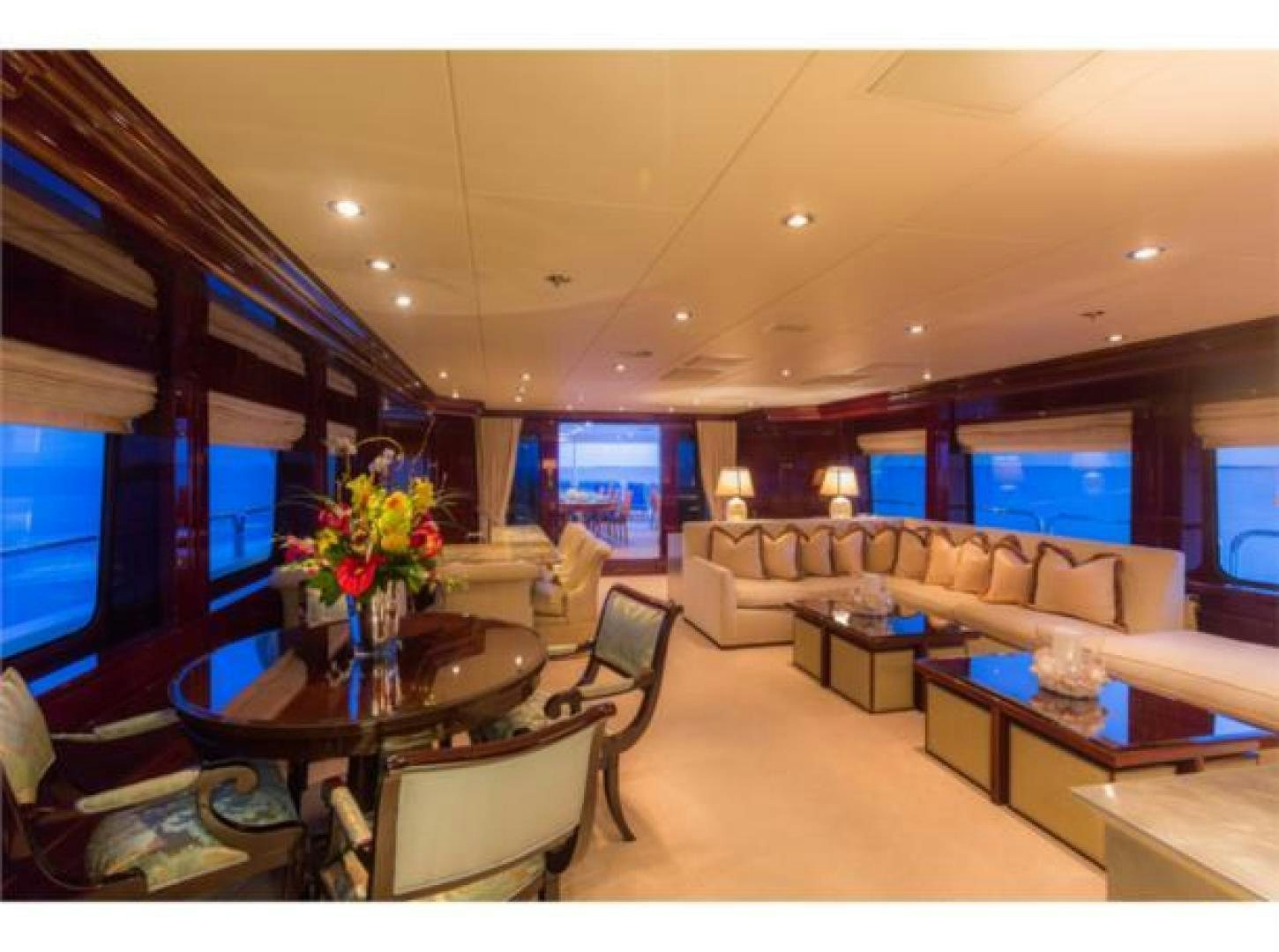 a living room with a large window aboard LADY JOY Yacht for Sale