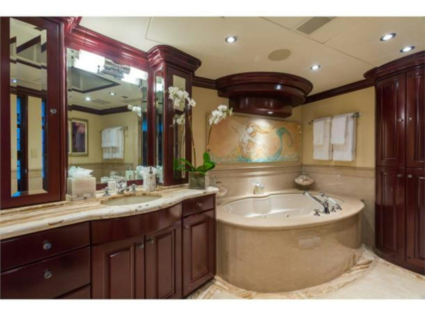 a bathroom with a large tub aboard LADY JOY Yacht for Sale