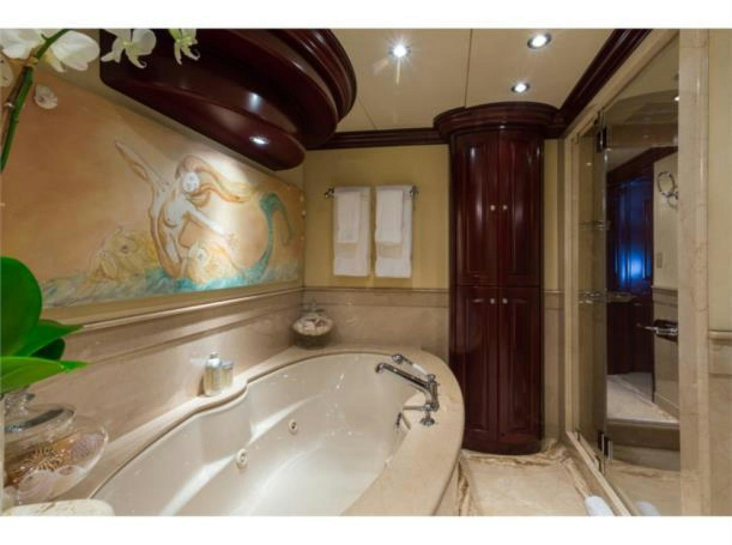 a bathroom with a large bathtub aboard LADY JOY Yacht for Sale