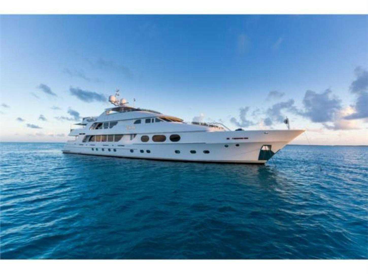 a white yacht in the water aboard LADY JOY Yacht for Sale